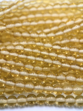 6mm Round Druk- Light Topaz
