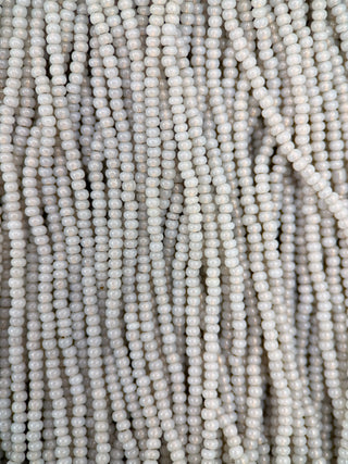 Size 11/0 Czech Glass- #875 White Opal Bronze Lined