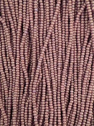 Size 11/0 Czech Glass- #1260 Puce Glow
